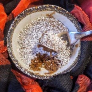 This gingerbread mug cake has all the cozy spices of the best gingerbread cake. Cinnamon, ginger, molasses, all in a single-serving dessert!