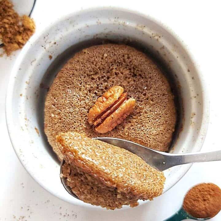 Single serving cinnamon mug cake with pecans