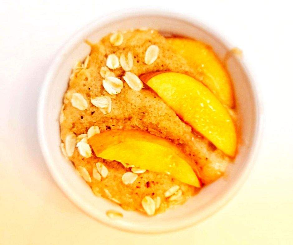This peach mug cake is an easy dessert that can be prepared in just a few minutes. It's a single-serving treat that combines the sweetness of ripe peaches with the warm, comforting goodness of a cake.